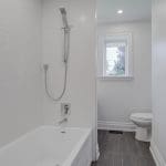 Image inside the Comfort Room with Bath Tub of the house at 21 Oldham Road